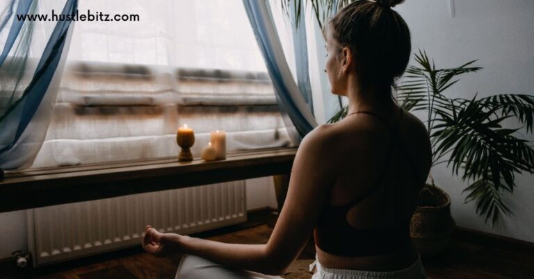 A woman doing meditation inside the room