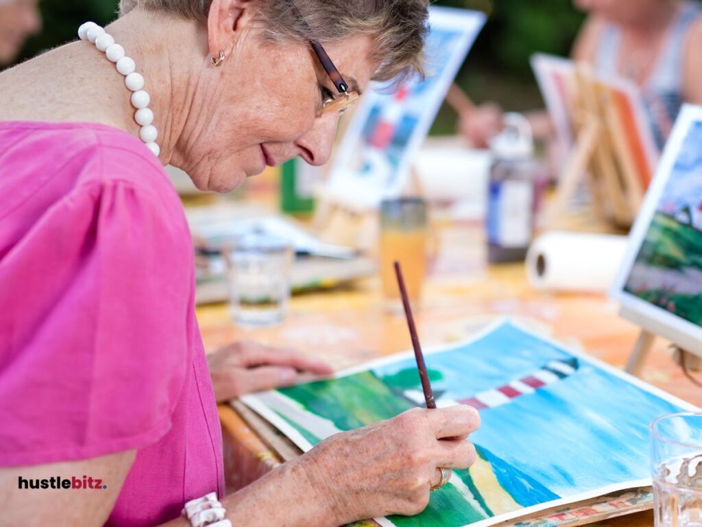 An old lady doing painting