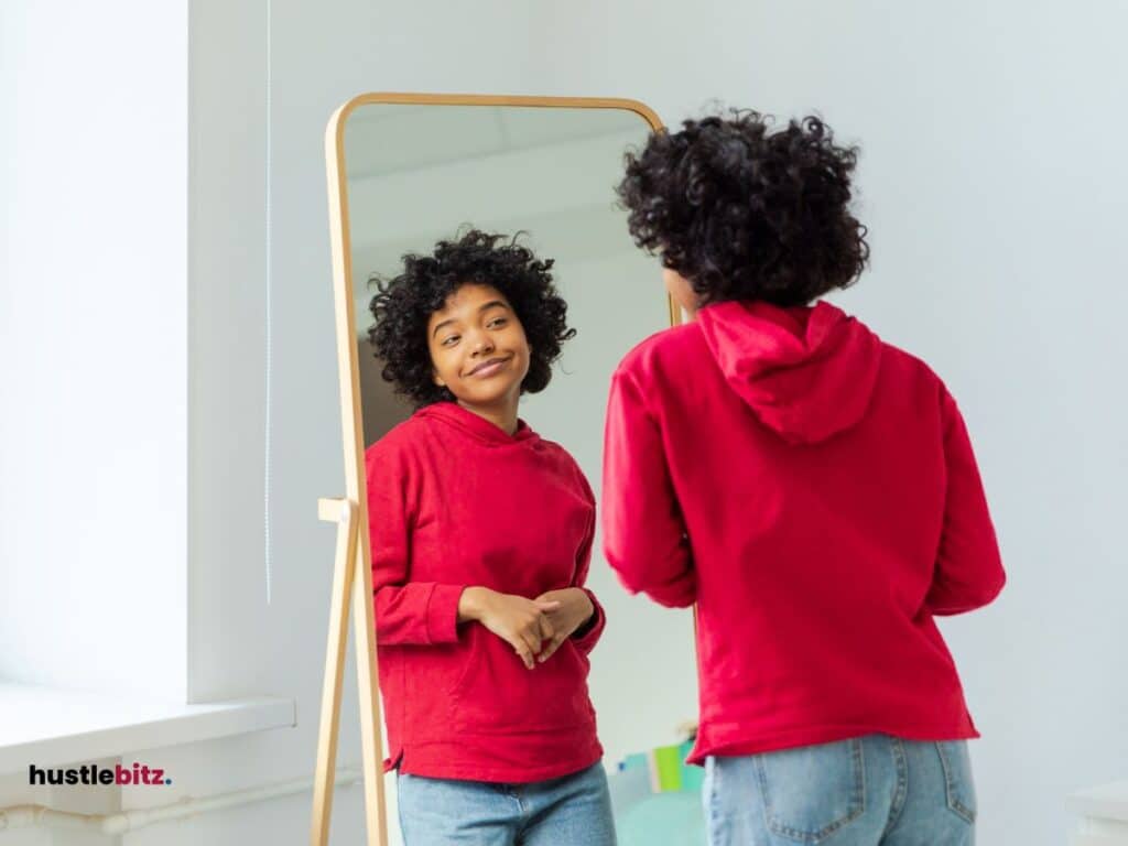 picture of a woman in front of the mirror