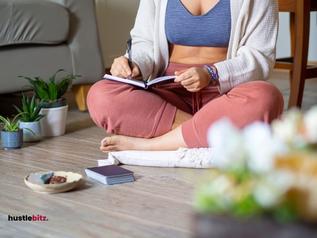 A woman writing her journal book