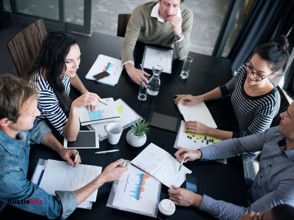 a group of people sitting and chatting to each other