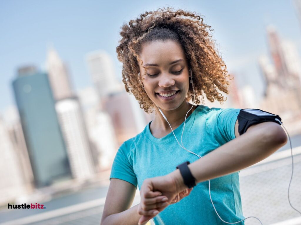 A woman wearing headset looking at her watch