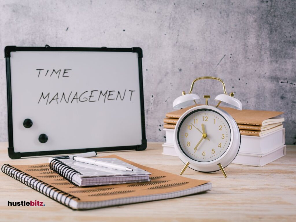 a monitor and a clock in the table