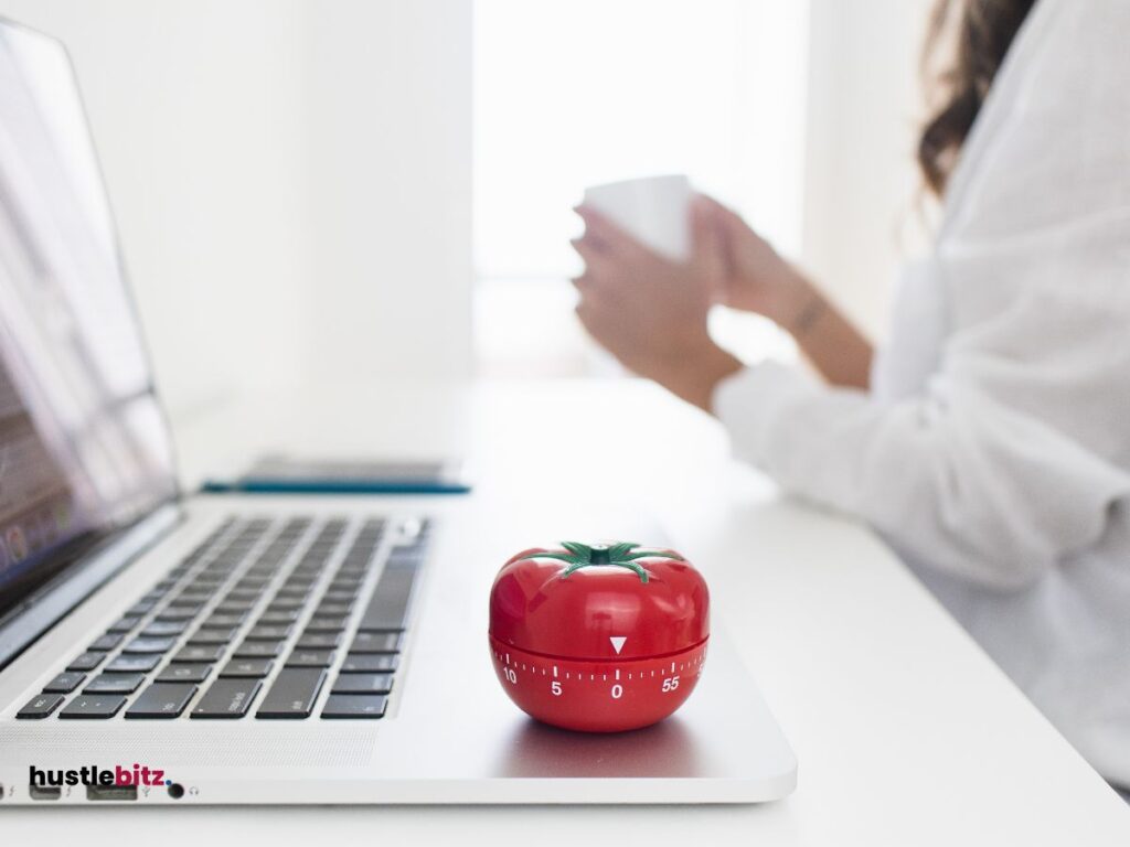 A picture of Pomodoro and a woman holding a cup 