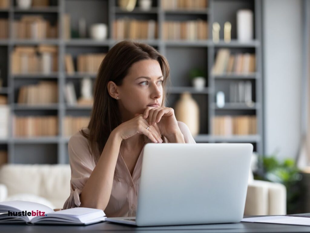 a picture of a woman inside the office looking at the left side