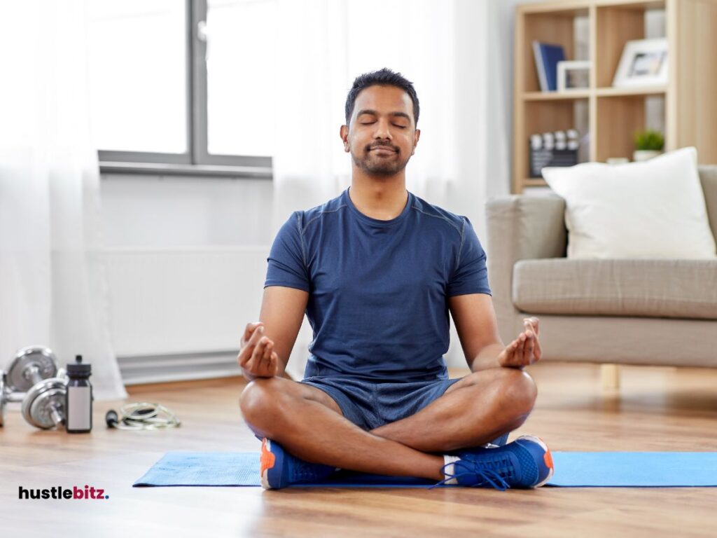 A man doing meditation inside the house