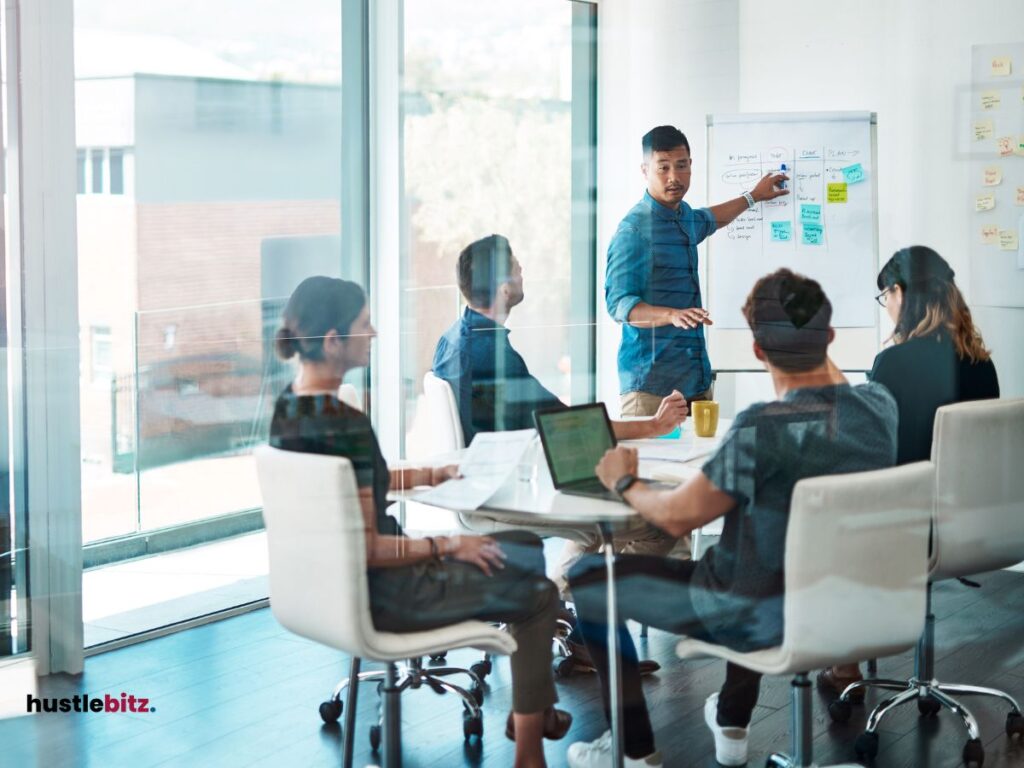 a group of people doing meeting inside the office