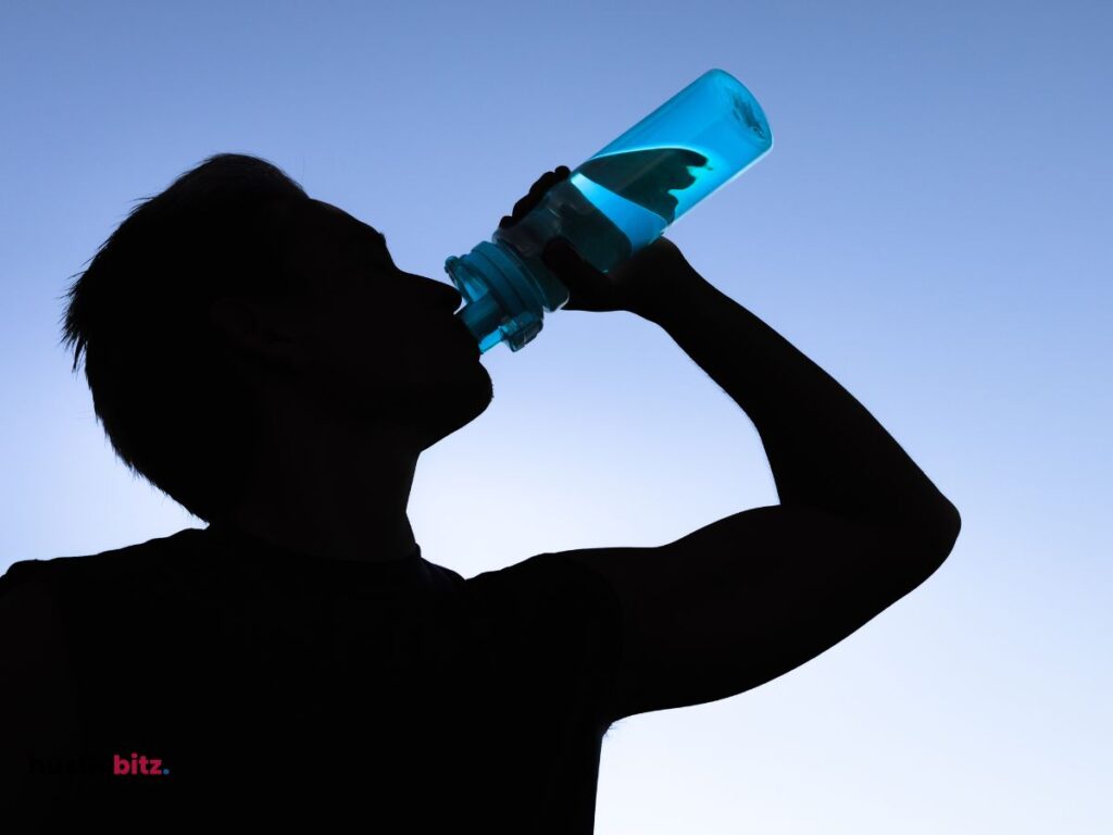 A man drink a bottle of water