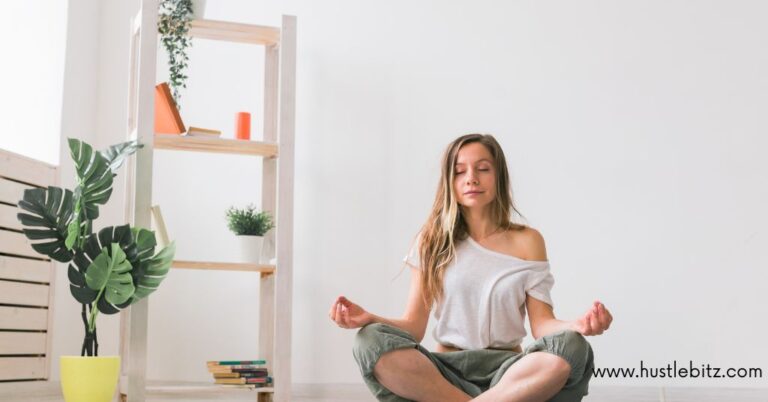 a woman doing meditation inside the house