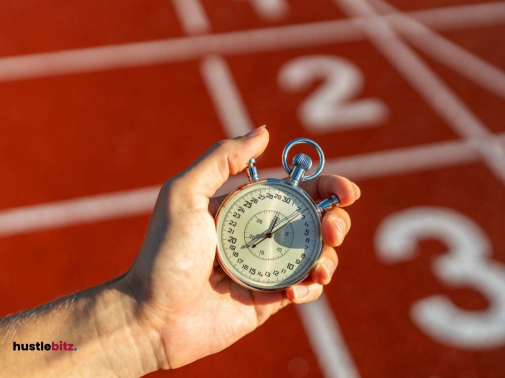 A man holding a stopwatch 