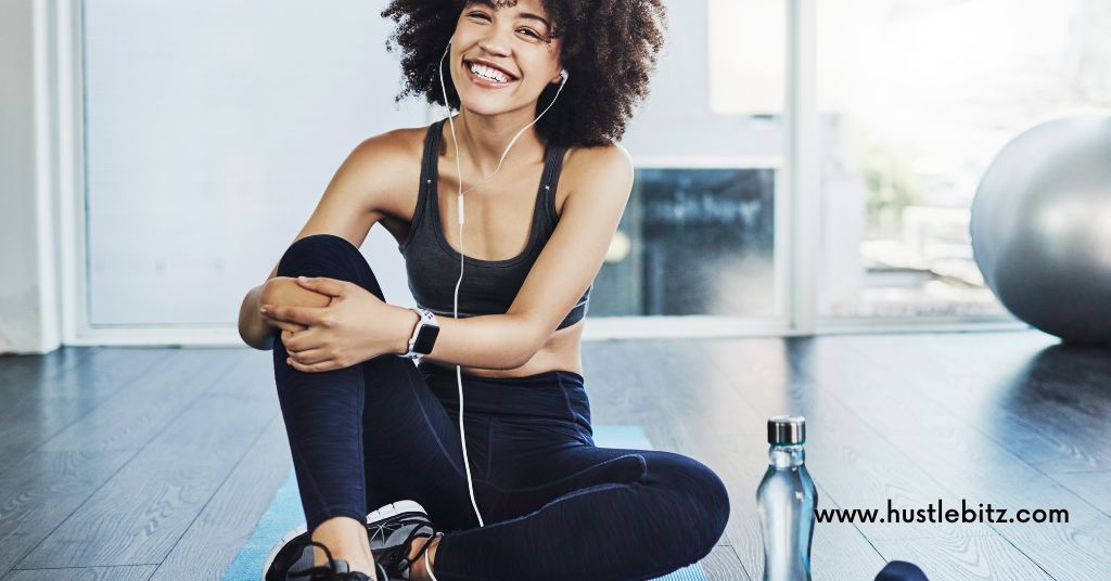 A woman wearing headset smile in front of the camera