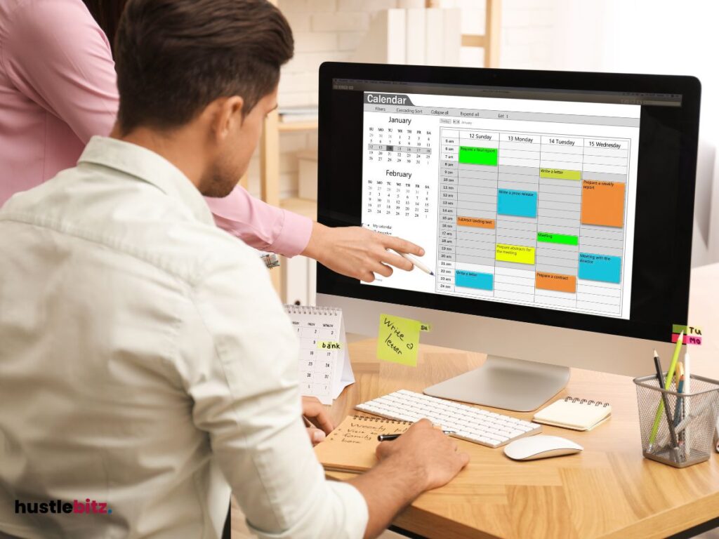 two person looking at the monitor