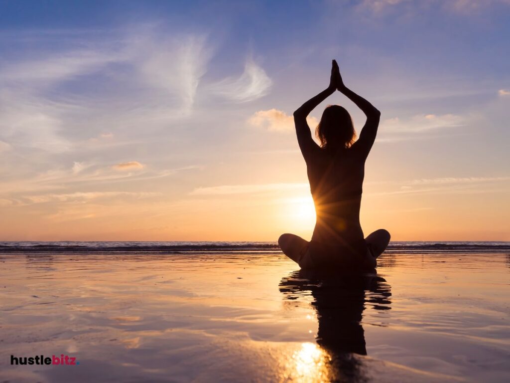 A woman doing meditation in the  water