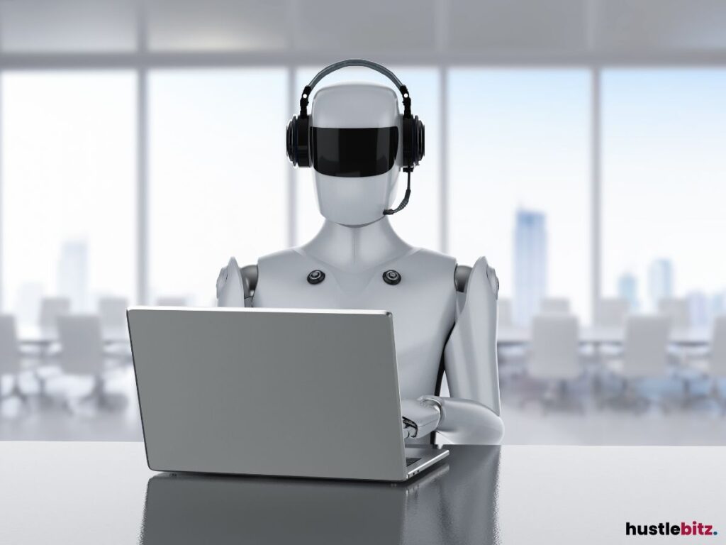 A humanoid robot wearing headphones, working on a laptop in an office.