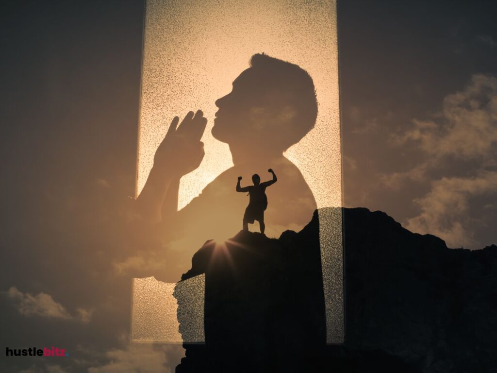 A person raising arms on a mountain, representing personal transformation and triumph.