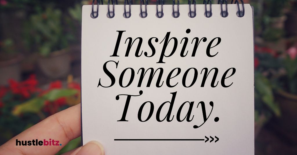 A notepad with the words "Inspire Someone Today" written on it.