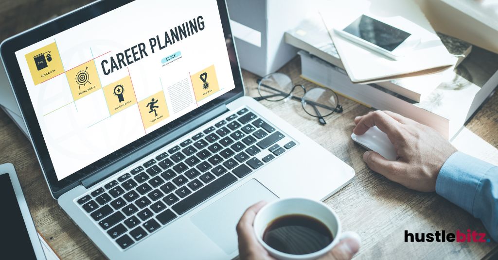a laptop with a word career planning and a hand holding coffee