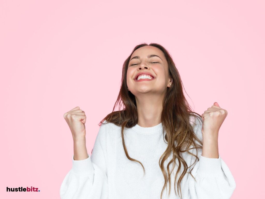 A woman looking up and smiles