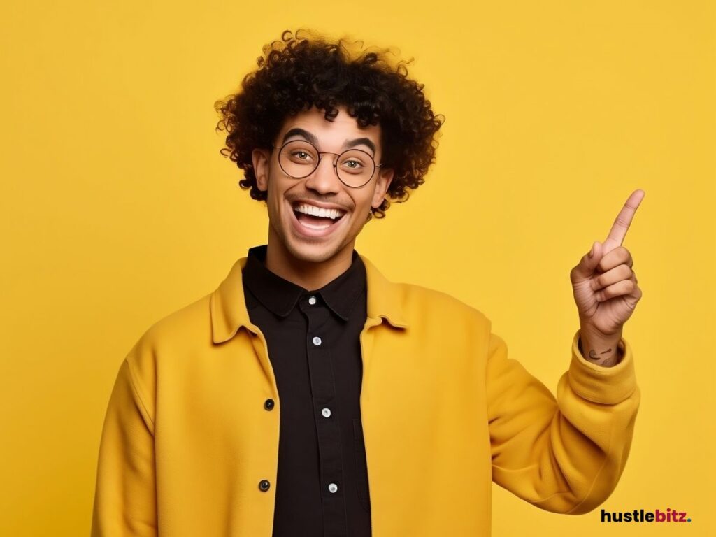 A man wearing yellow coat having a huge smile while pointing up.