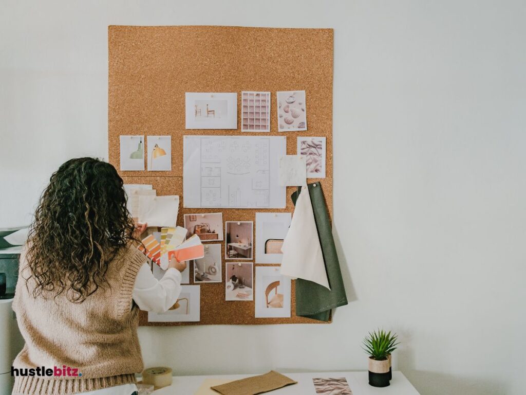 A woman posting on the bulletin board