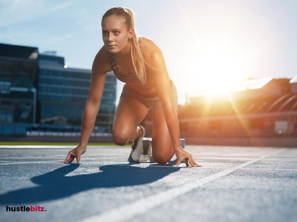 A woman preparing for track in field 