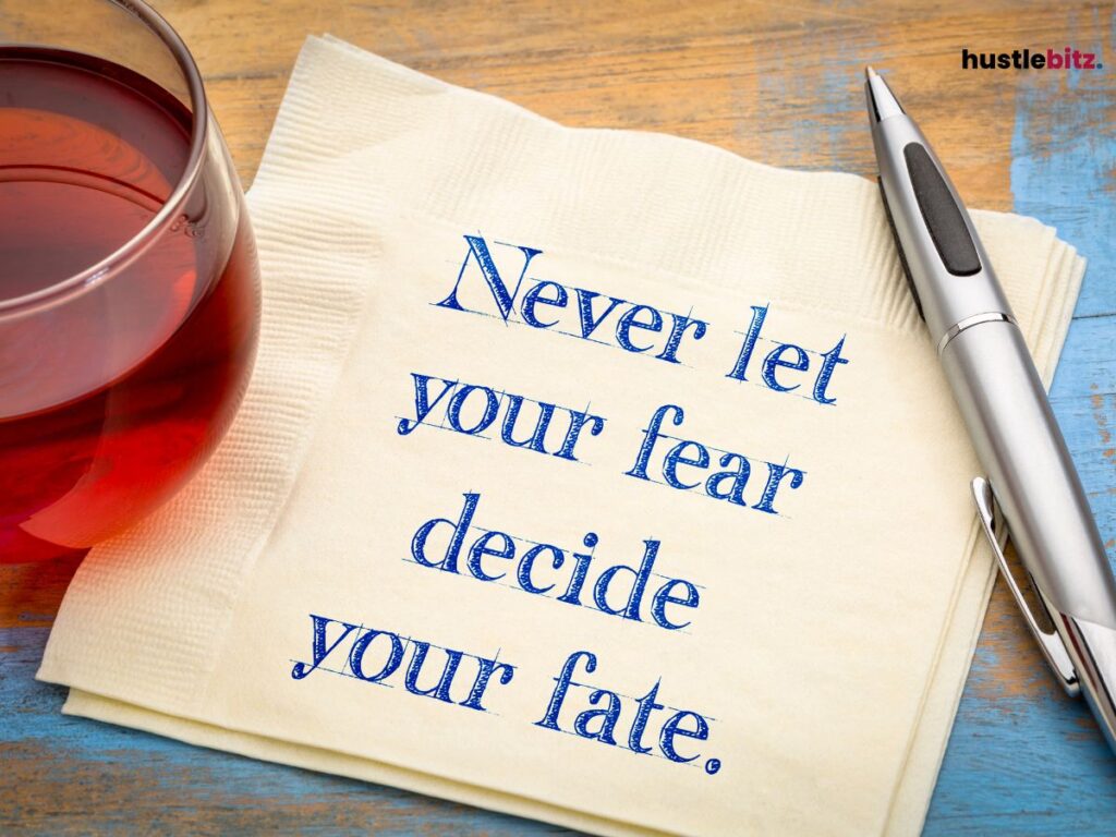 A napkin with "Never let your fear decide your fate," encouraging courage and resilience.