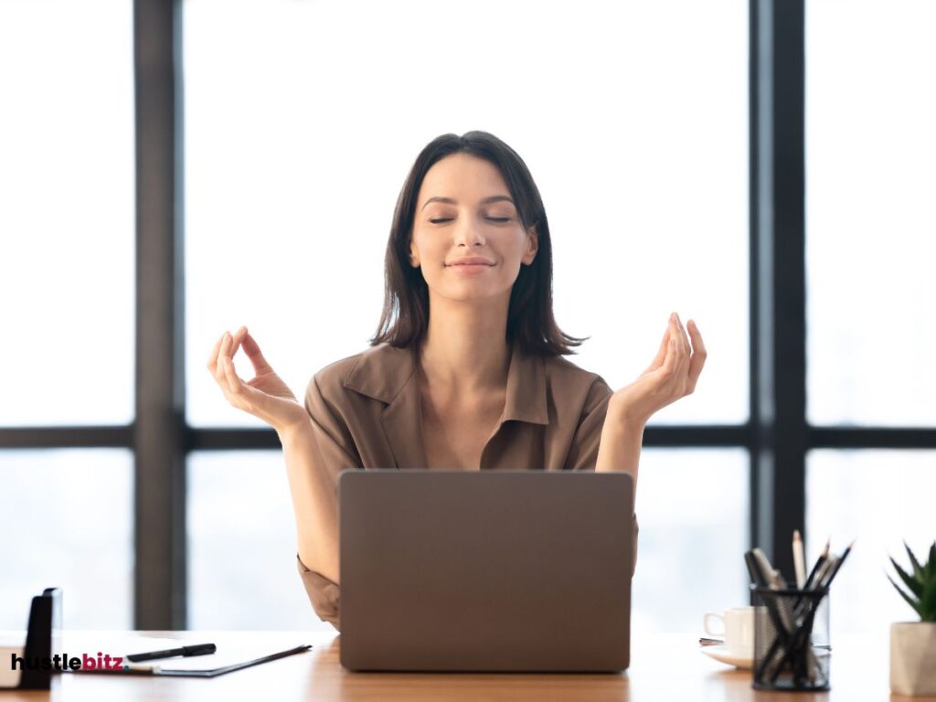 A woman doing meditation inside the office