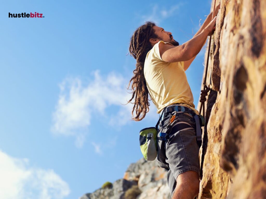 A man climbing the mountain rock