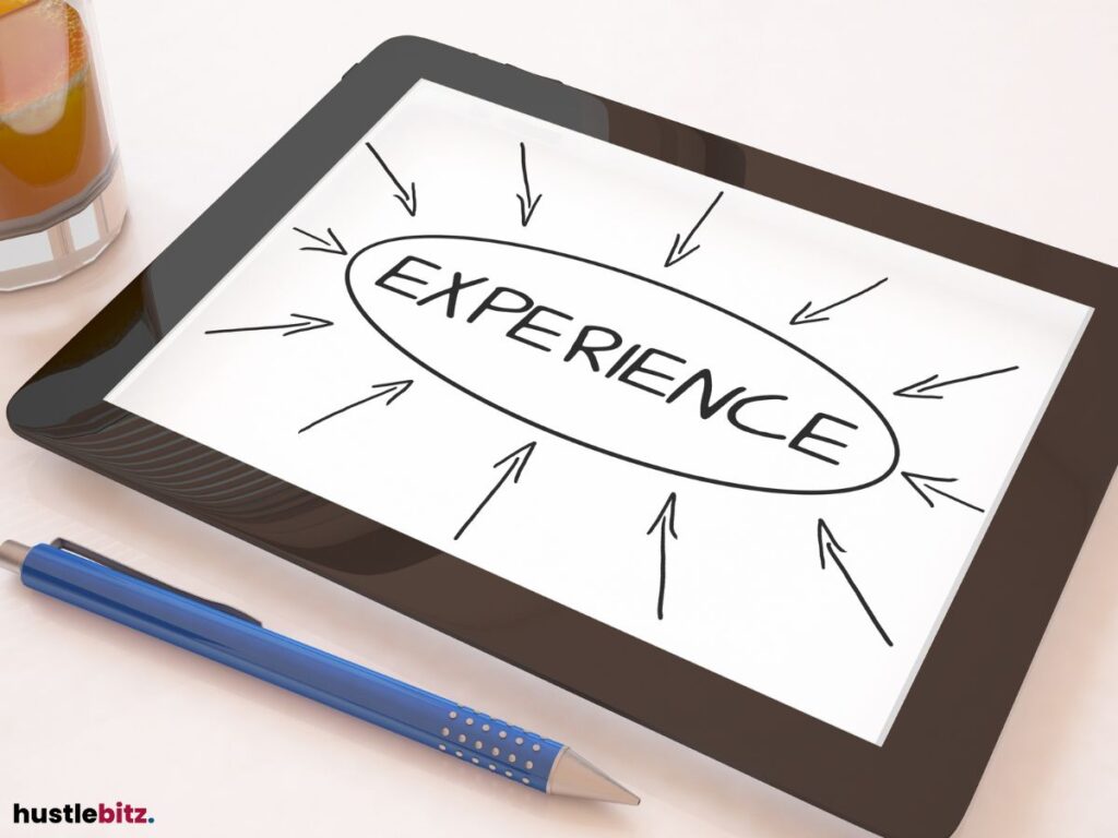 A tablet displays "Experience" surrounded by arrows pointing inward.