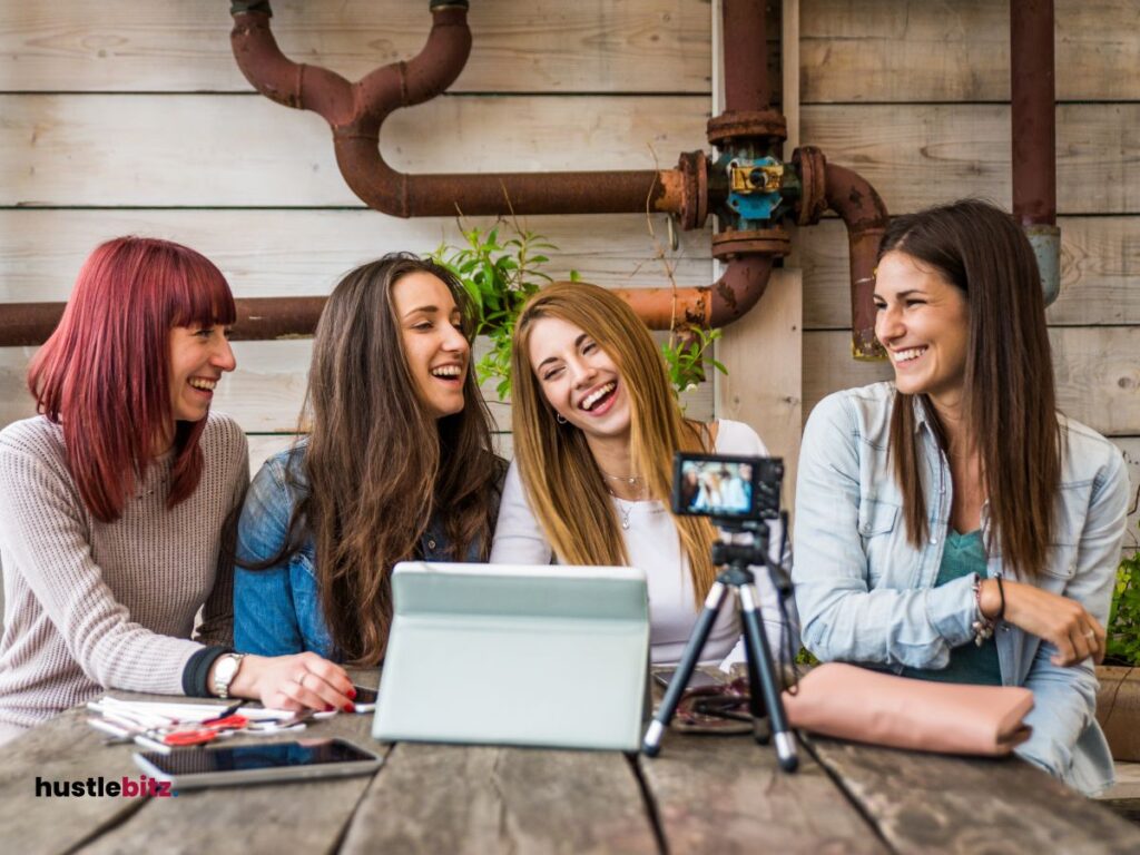 A group of women smiles and talking to each other