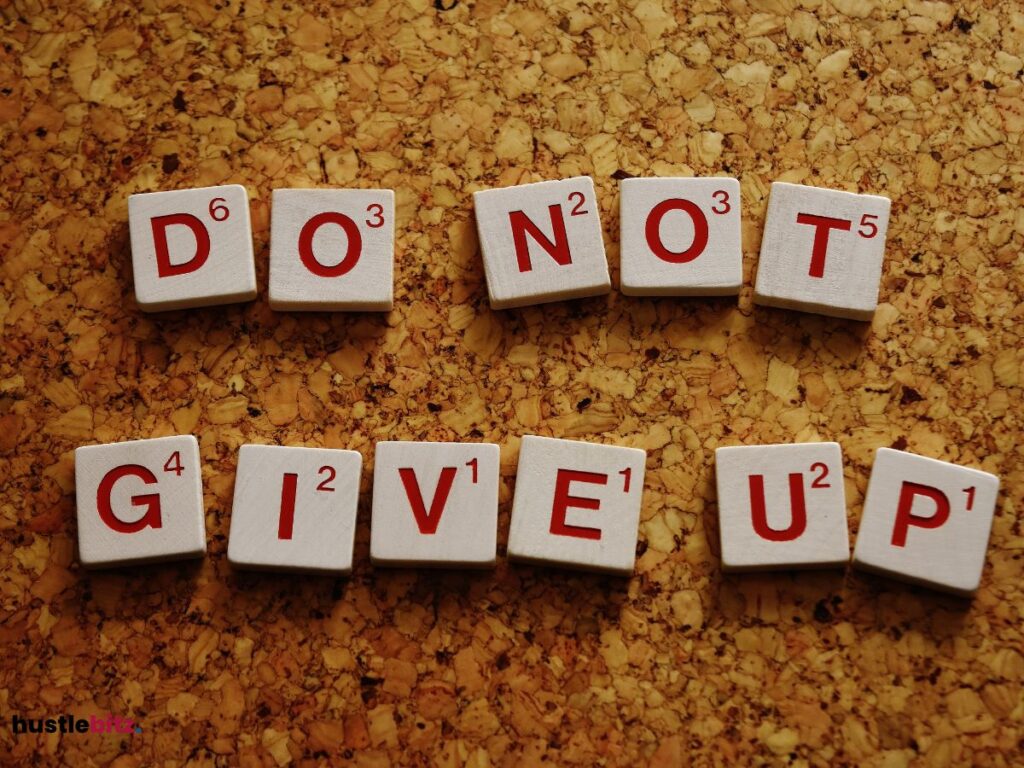 A dice with motivational quotes about do not give up