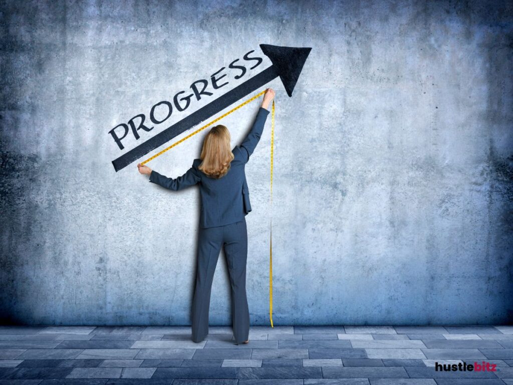 A woman measuring the word progress