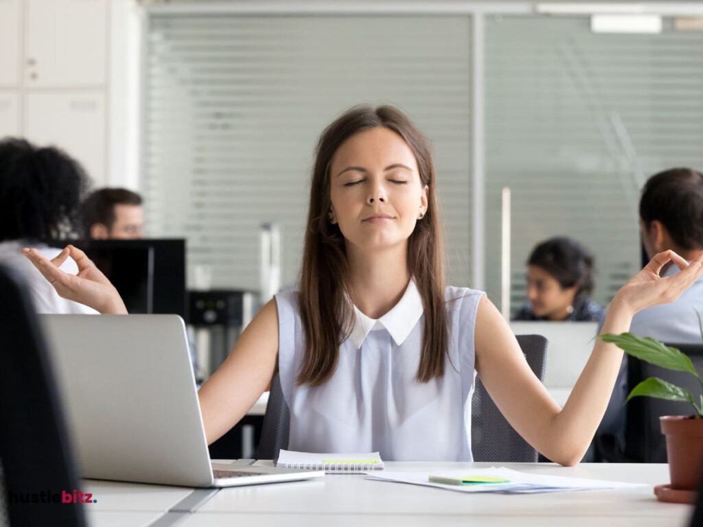 A woman doing mindfulness inside the office