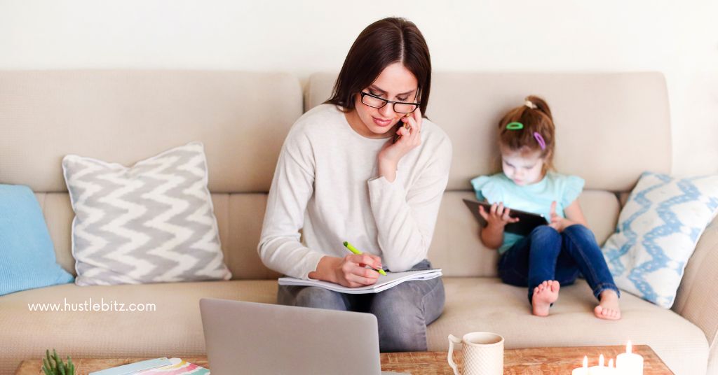 A woman working with a child on her side