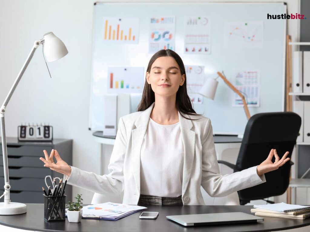 A woman doing meditation in the office
