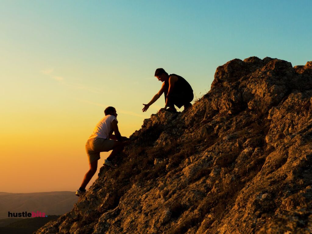 two men on the rock mountain