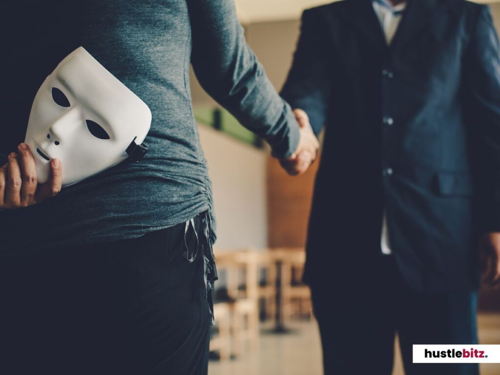 A person shaking hands while hiding a mask behind their back.