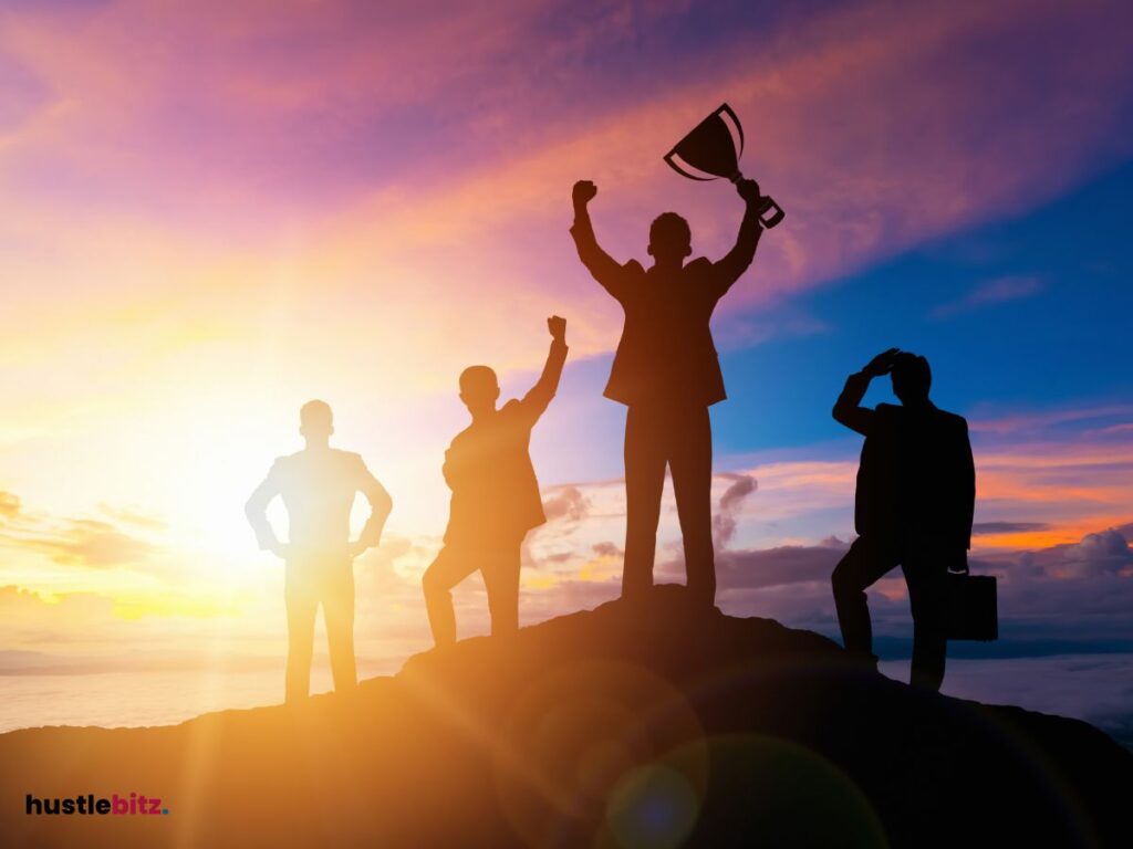group of people standing in the mountain and other man holding a trophy
