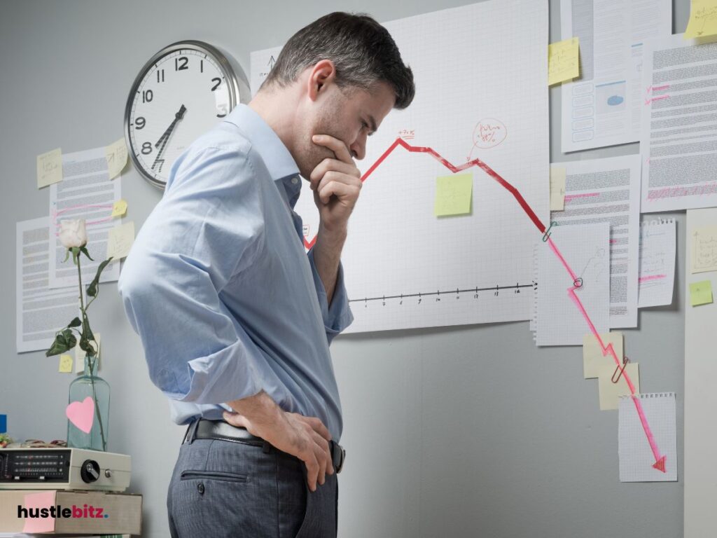 A man hold his chin thinking something and a clock in the wall