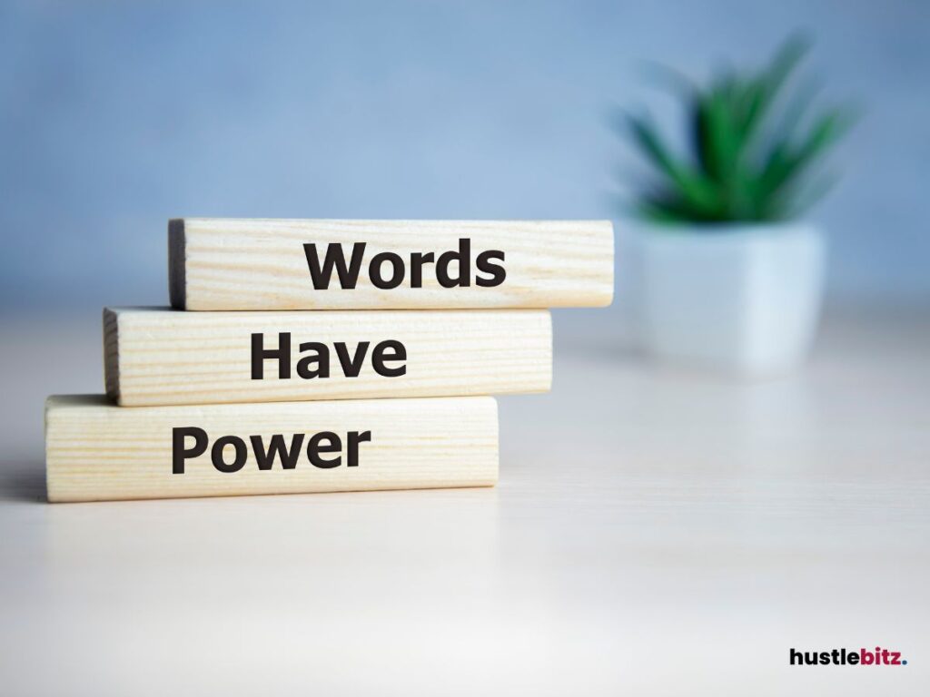 Stacked wooden blocks with "Words Have Power".