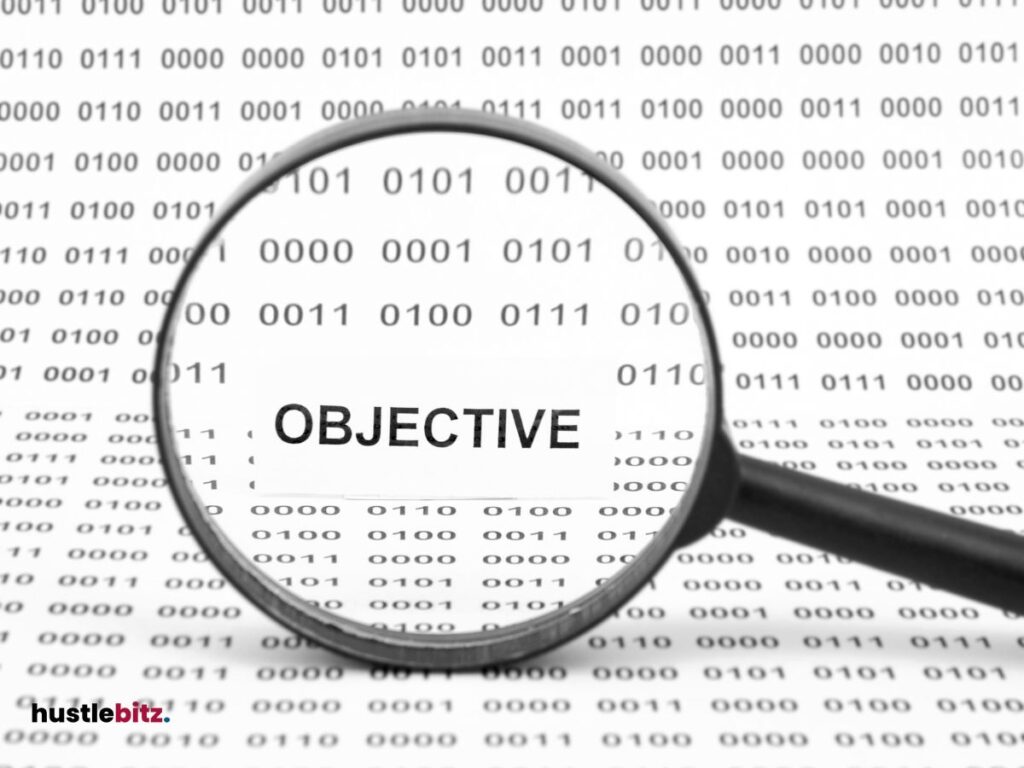 magnifying glass and a word "objective"