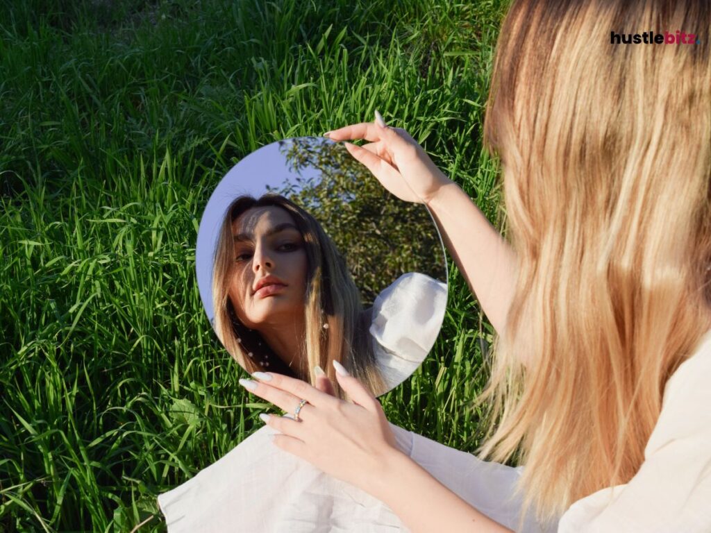 woman holding a mirror