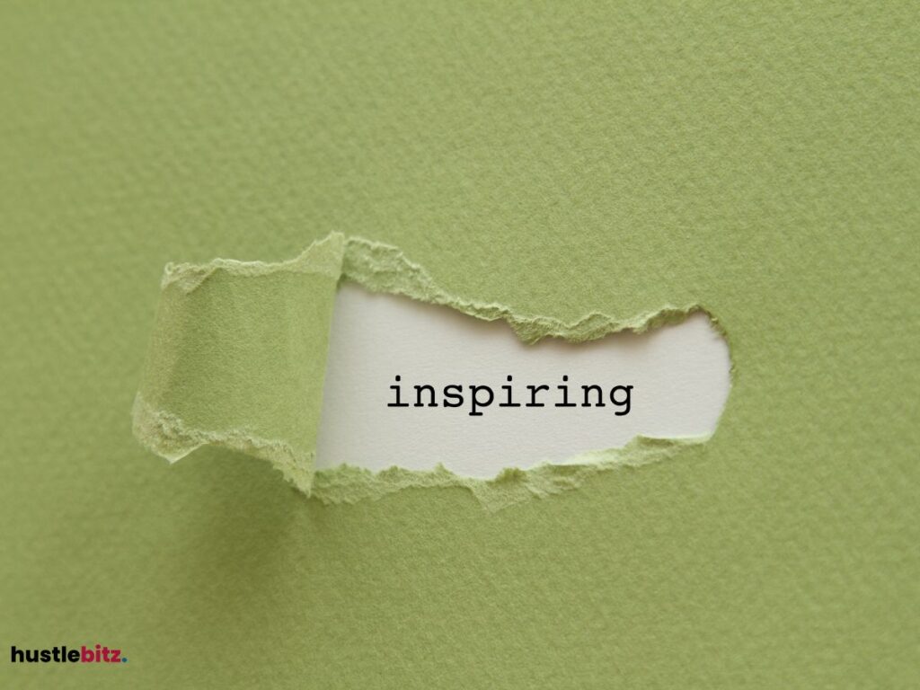 Torn paper revealing the word "Inspiring" underneath.