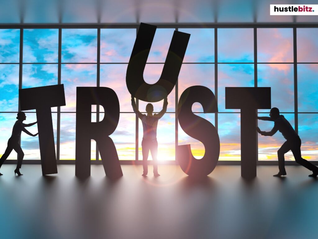 Team building the word "TRUST," symbolizing integrity and collaboration.