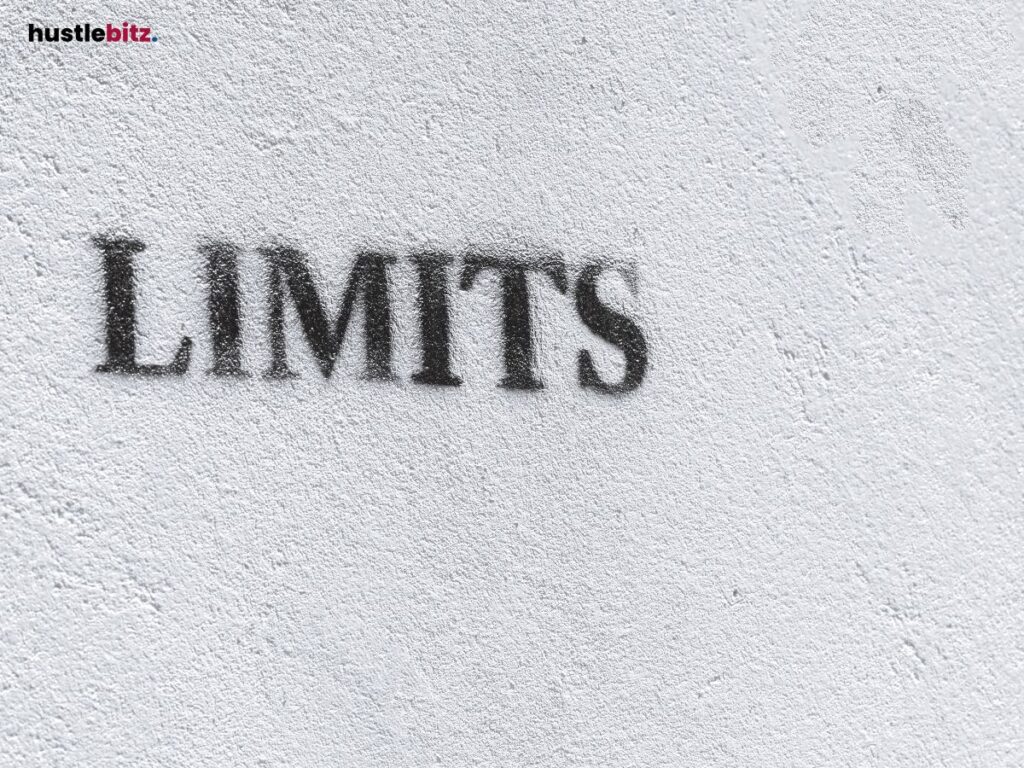 The word "LIMITS" spray-painted on a textured wall.