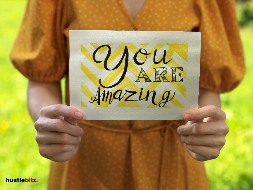 A woman holding a positive quotes