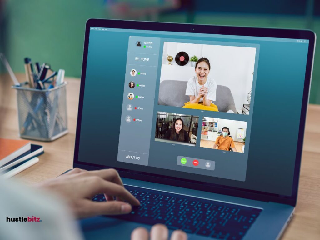 Laptop screen showing a virtual meeting with participants in a video call.