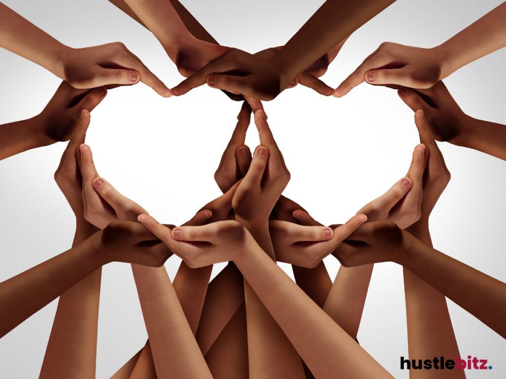 Multiple hands forming a heart shape.