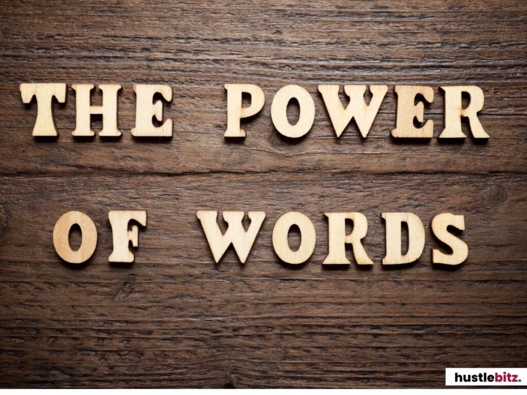 Wooden letters arranged on a rustic wooden surface.