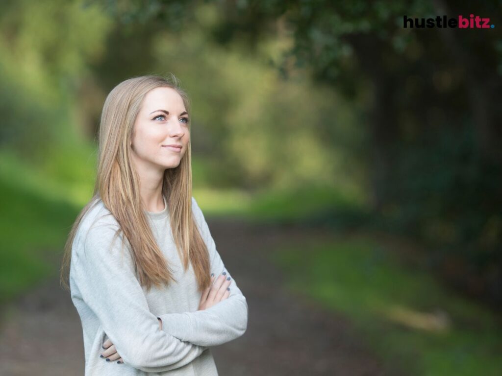 A woman looking at the nature smiles